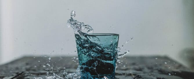 water glass splashing