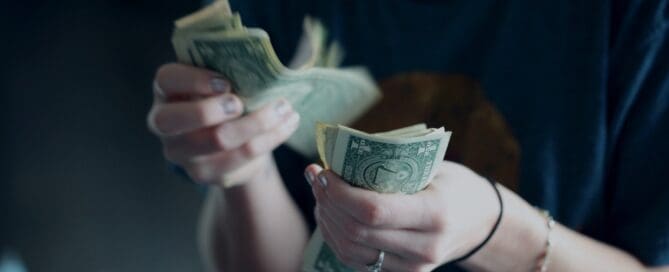 person counting money