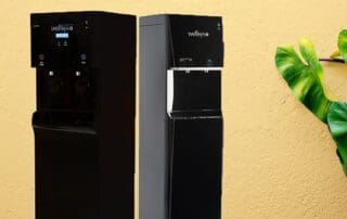 two water coolers standing side by side