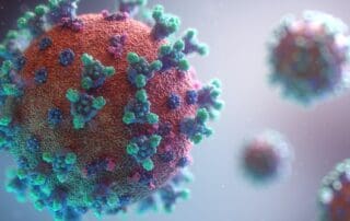 pink green and blue viruses floating in air
