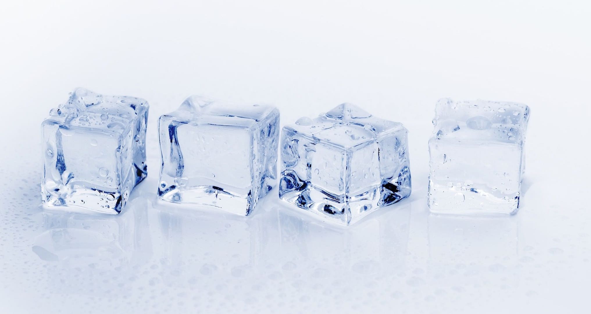 ice cubes melting on table