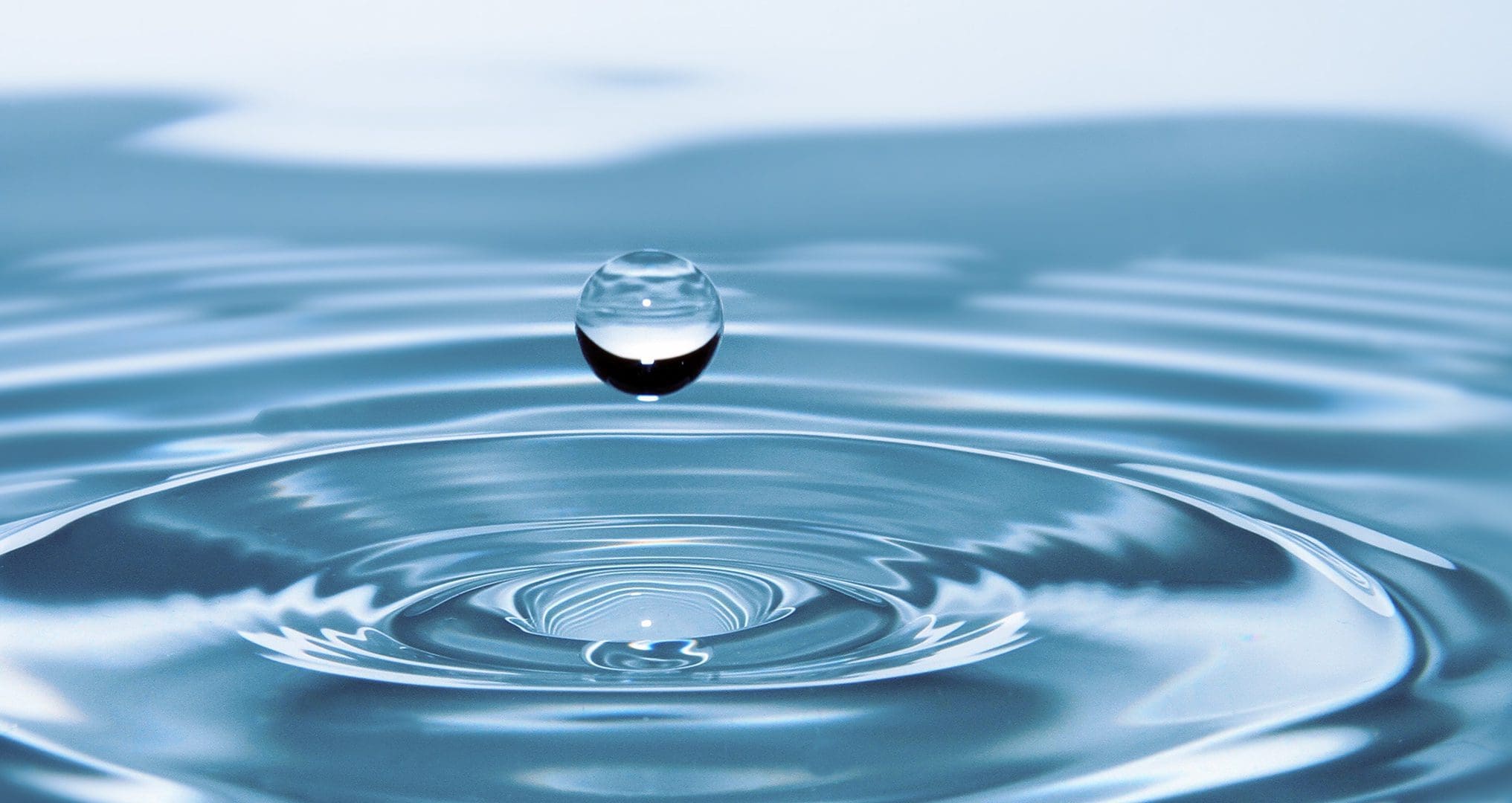 water droplet falling into water