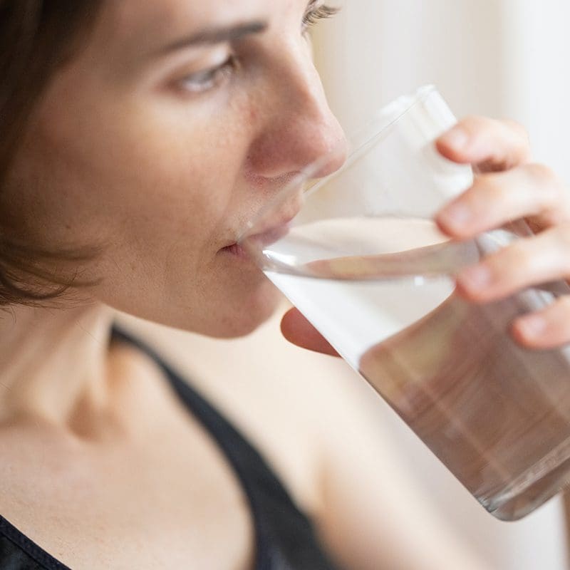 woman drinking clean water