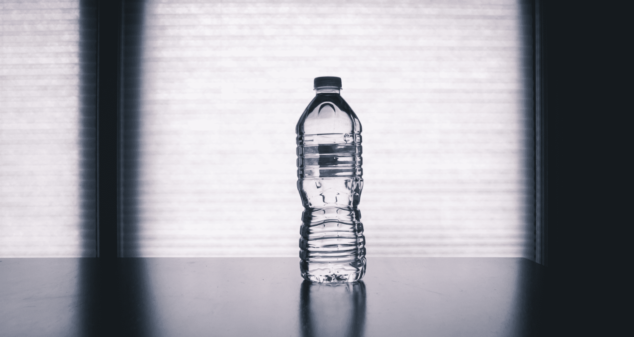 Bottled water on top of the table