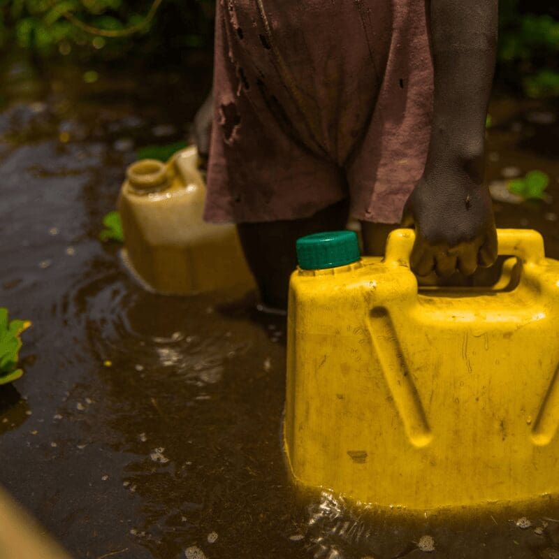 gathering drinking water in uganda ,charity water