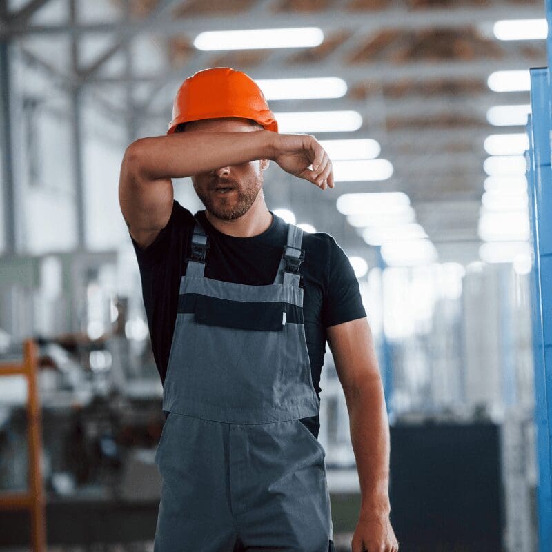 hot and exhausted warehouse worker