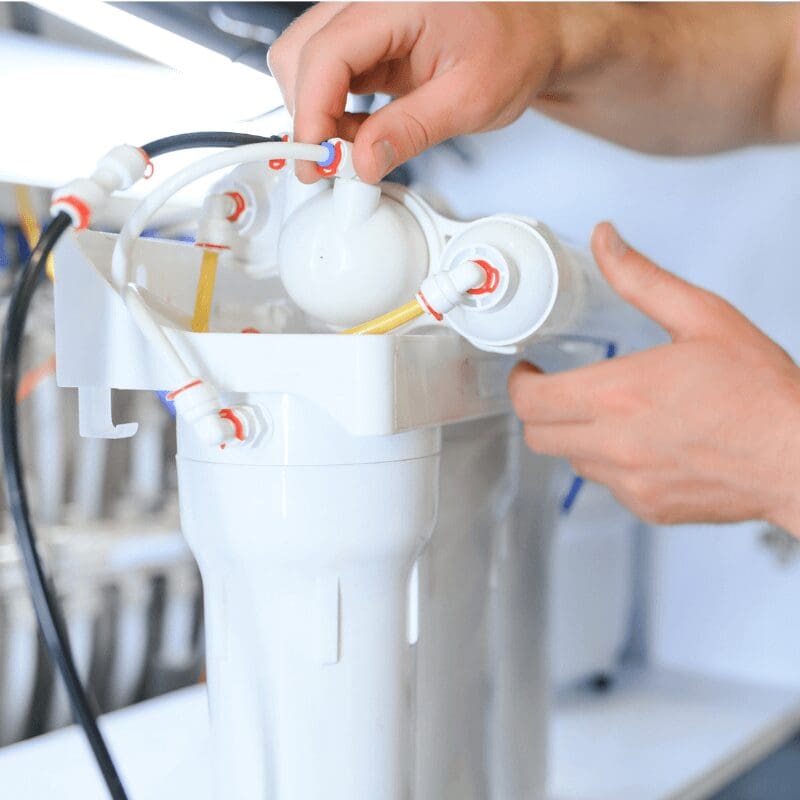 changing water filters from under-the-sink filter system